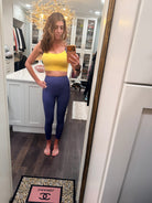 Me modeling the "cool yellow and blue" set. I love the built in bra - no more wrestling with inserts after laundry's done. I took this for sizing purposes- I am 5'9", 130 (ish) lbs with a 34C cup size. I followed the sizing chart exactly and bought a size medium. It fits perfectly!