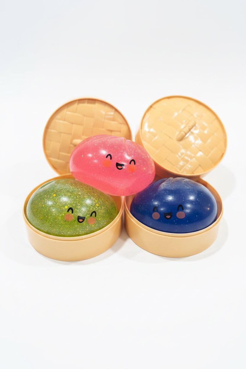 Three colorful Mystery Dumpling sensory toys revealed in dumpling baskets