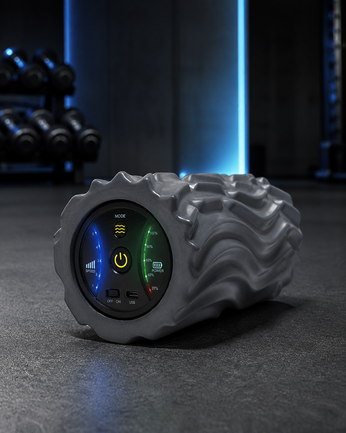 Space-gray five-speed vibrating foam roller in an athletic recovery setting